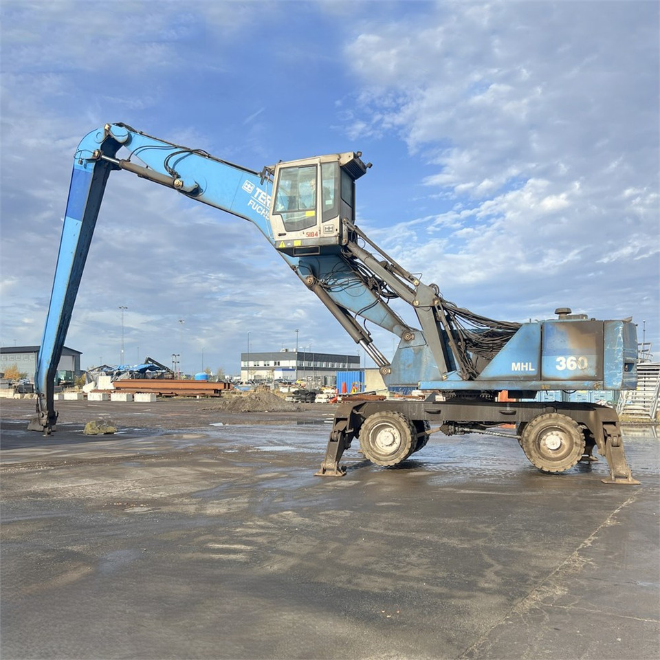 Fuchs MHL 360 - حفارة النقل والشحن: صور 2 Fuchs MHL 360 - حفارة النقل والشحن: صور 2