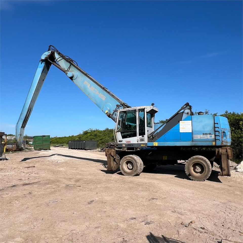 Fuchs MHL350 - حفارة النقل والشحن: صور 2 Fuchs MHL350 - حفارة النقل والشحن: صور 2