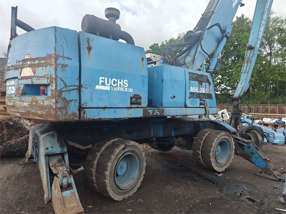 Fuchs MHL360 - حفارة النقل والشحن: صور 2 Fuchs MHL360 - حفارة النقل والشحن: صور 2