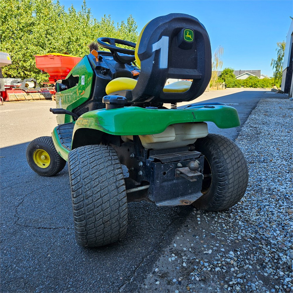 John Deere X304 - جزازة المروج: صور 5 John Deere X304 - جزازة المروج: صور 5