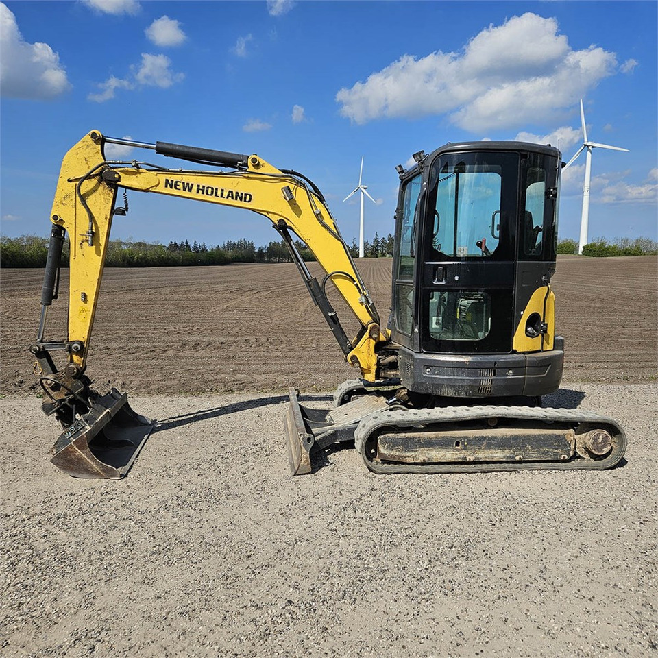 New Holland E39 B - حفارة مصغرة: صور 1 New Holland E39 B - حفارة مصغرة: صور 1