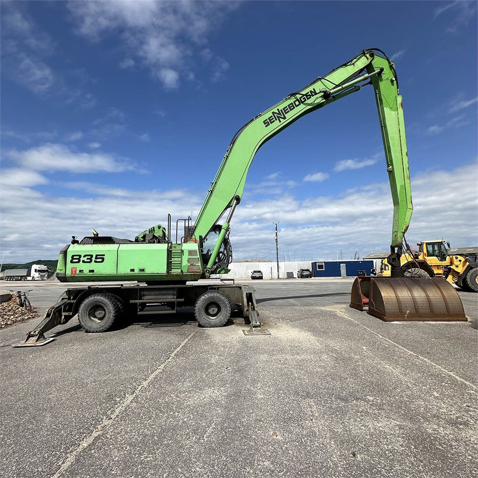 Sennebogen 835M - حفارة النقل والشحن: صور 2 Sennebogen 835M - حفارة النقل والشحن: صور 2