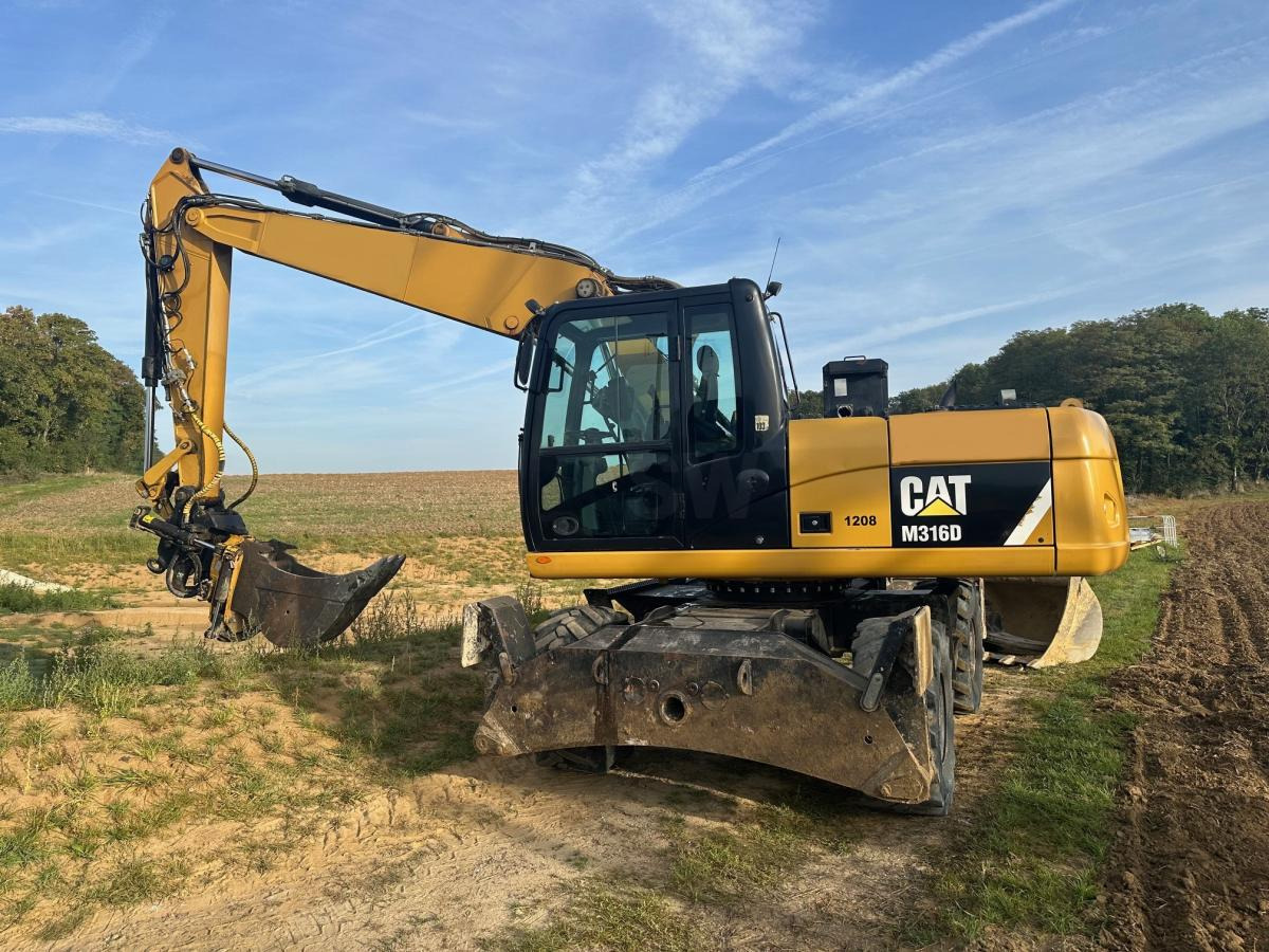 Caterpillar M 316D - حفارة على عجلات: صور 1 Caterpillar M 316D - حفارة على عجلات: صور 1