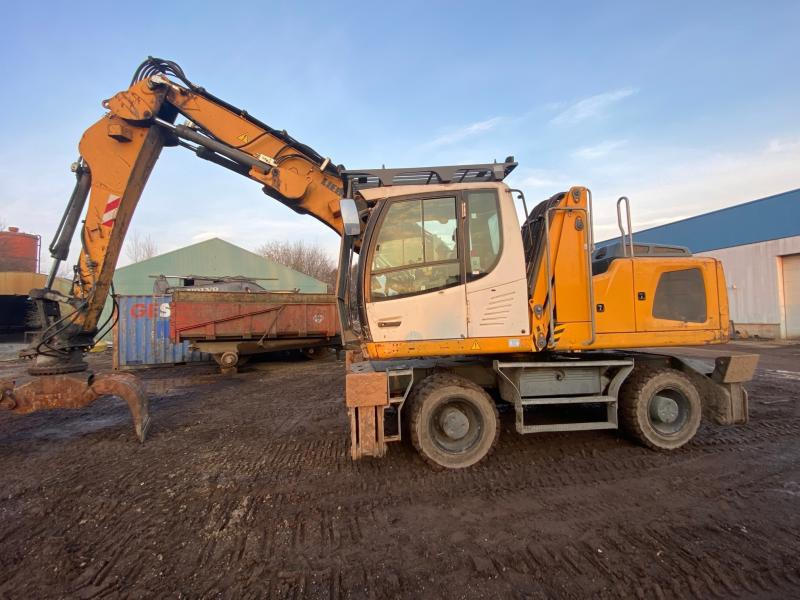 Liebherr LH 22 - حفارة النقل والشحن: صور 1 Liebherr LH 22 - حفارة النقل والشحن: صور 1