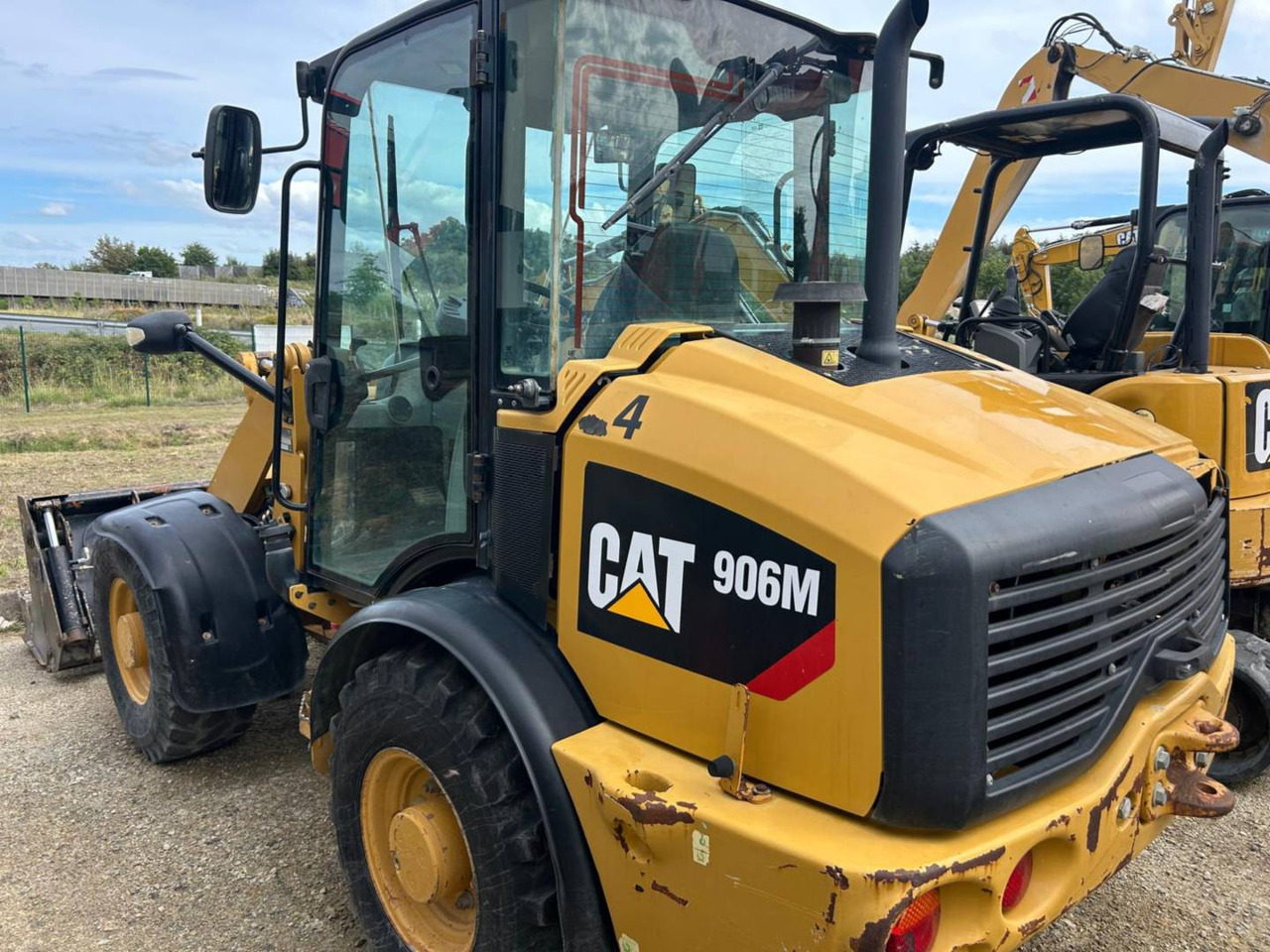 CAT 906M - اللودر بعجل: صور 4 CAT 906M - اللودر بعجل: صور 4