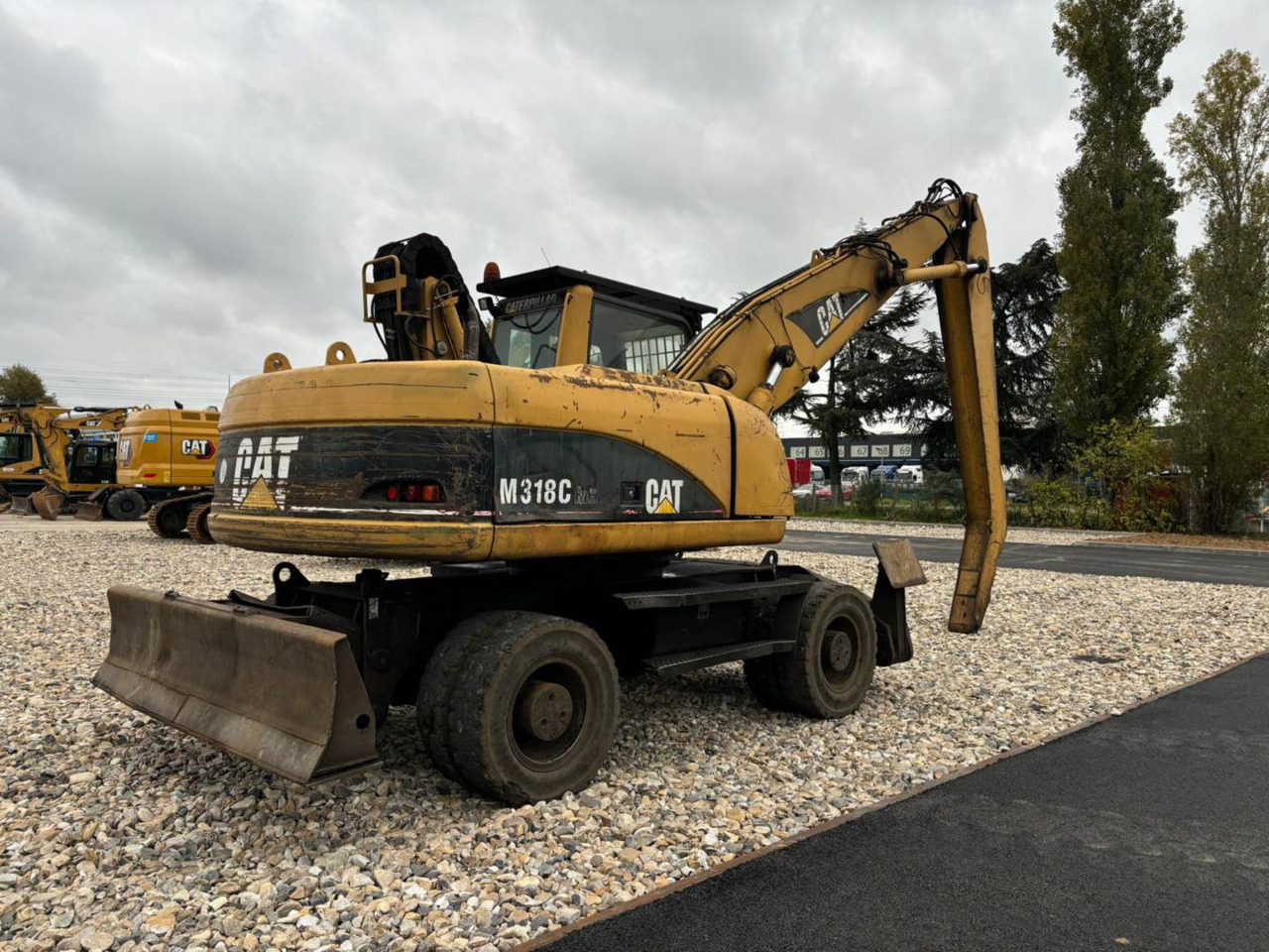 CAT M318C - حفارة على عجلات: صور 4 CAT M318C - حفارة على عجلات: صور 4