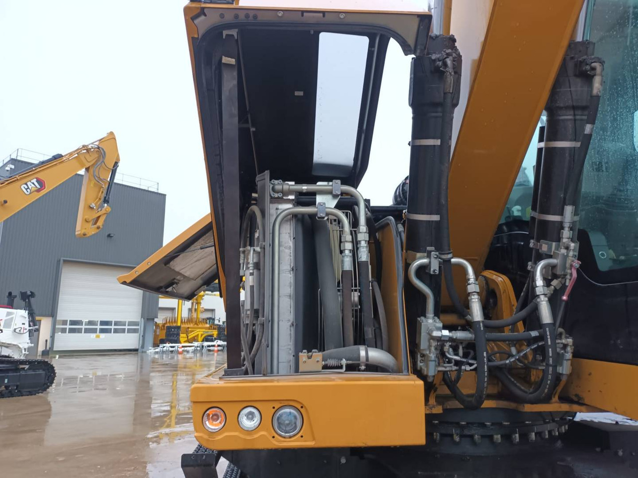 حفارة على عجلات CAT MH3024-1: صور 17