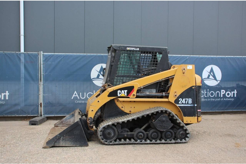 Caterpillar 247B - اللودر المجنزر: صور 1 Caterpillar 247B - اللودر المجنزر: صور 1