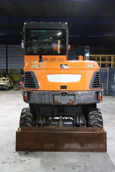 Doosan DX55WK - حفارة على عجلات: صور 4 Doosan DX55WK - حفارة على عجلات: صور 4