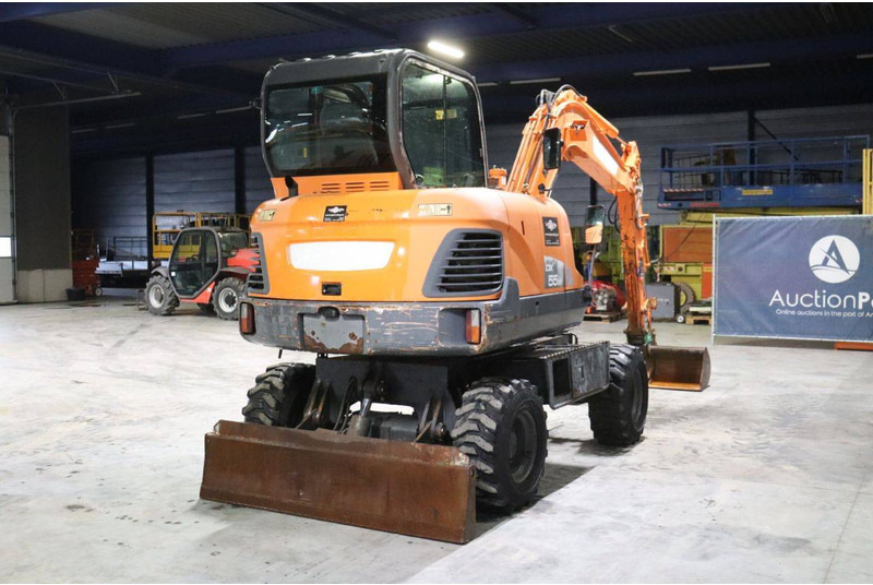 Doosan DX55WK - حفارة على عجلات: صور 5 Doosan DX55WK - حفارة على عجلات: صور 5