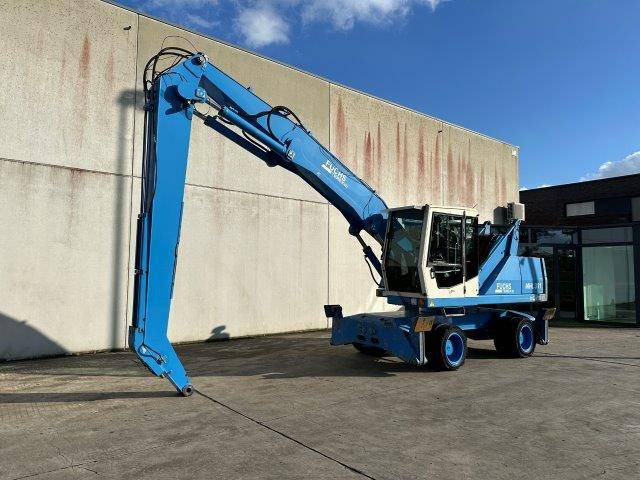 Fuchs MHL331 - حفارة النقل والشحن: صور 1 Fuchs MHL331 - حفارة النقل والشحن: صور 1