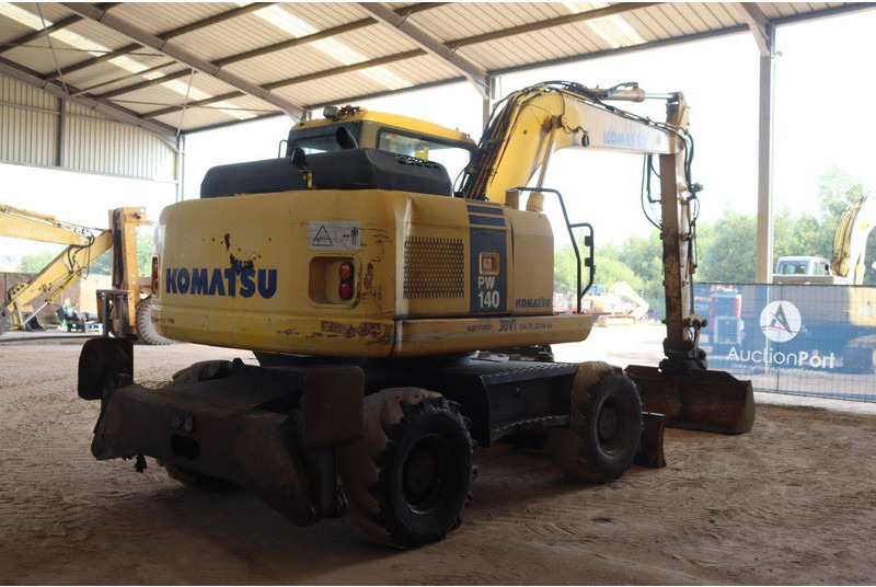 Komatsu PW140-7 - حفارة على عجلات: صور 5 Komatsu PW140-7 - حفارة على عجلات: صور 5