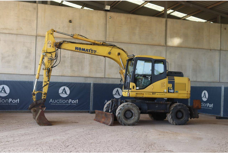 Komatsu PW140-7 - حفارة على عجلات: صور 1 Komatsu PW140-7 - حفارة على عجلات: صور 1