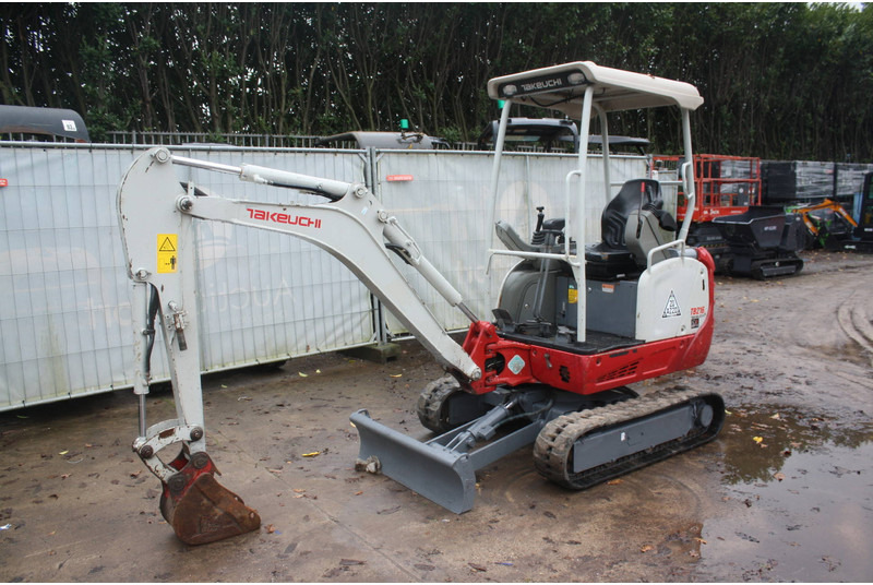 Takeuchi TB216 - حفارة مصغرة: صور 1 Takeuchi TB216 - حفارة مصغرة: صور 1