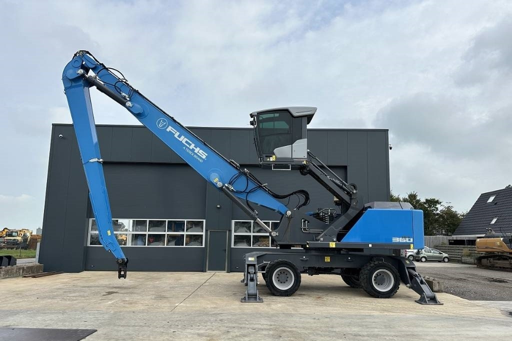 Fuchs MHL 360 F - حفارة النقل والشحن: صور 1 Fuchs MHL 360 F - حفارة النقل والشحن: صور 1