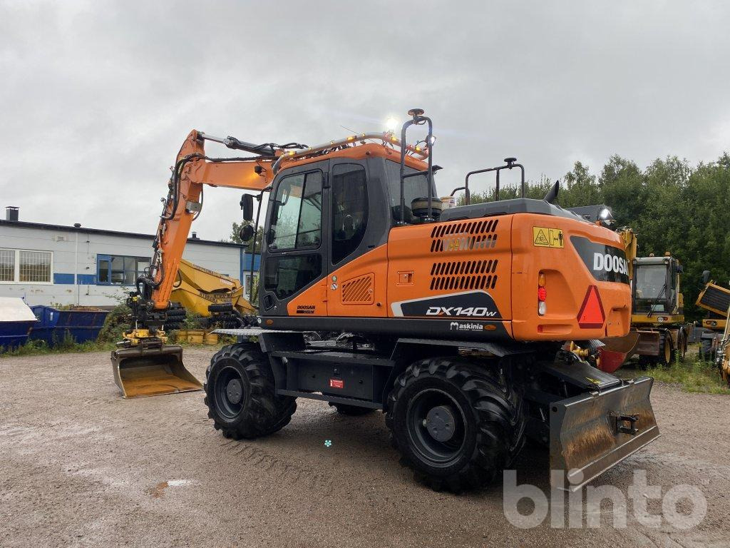 Doosan DX 140W - حفارة على عجلات: صور 4 Doosan DX 140W - حفارة على عجلات: صور 4