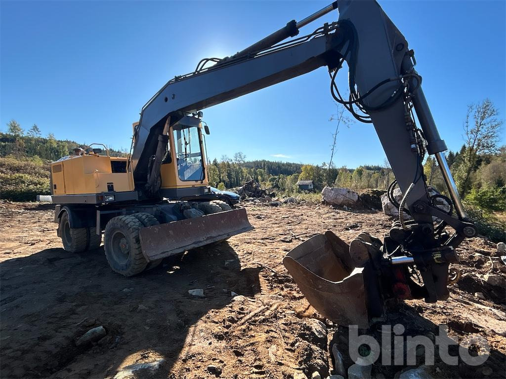 Volvo EW150C - حفارة على عجلات: صور 2 Volvo EW150C - حفارة على عجلات: صور 2