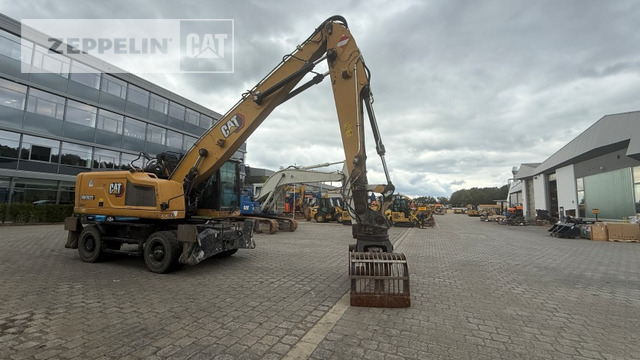 Cat MH3022-06C - حفارة النقل والشحن: صور 1 Cat MH3022-06C - حفارة النقل والشحن: صور 1