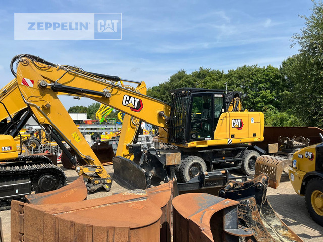 Cat MH3024-06C - حفارة النقل والشحن: صور 1 Cat MH3024-06C - حفارة النقل والشحن: صور 1