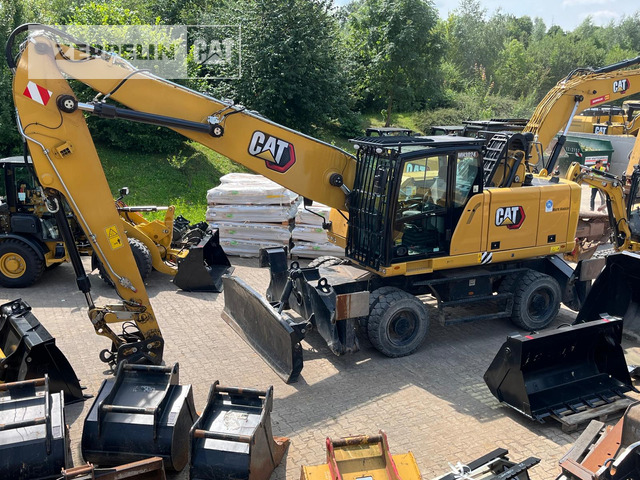 Cat MH3024-06C - حفارة النقل والشحن: صور 1 Cat MH3024-06C - حفارة النقل والشحن: صور 1