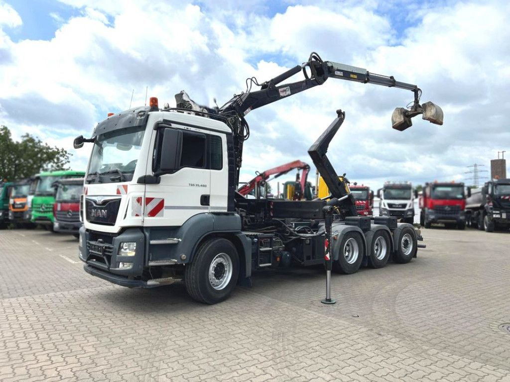 MAN TG-S 35.480 8x4 BL Abrollkipper mit Kran Penz-15 - شاحنة كرين: صور 1 MAN TG-S 35.480 8x4 BL Abrollkipper mit Kran Penz-15 - شاحنة كرين: صور 1